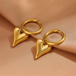 H519ff6c2e4be4e7ca250ecd45808087dD Golden Heart Charm Hoop Earrings